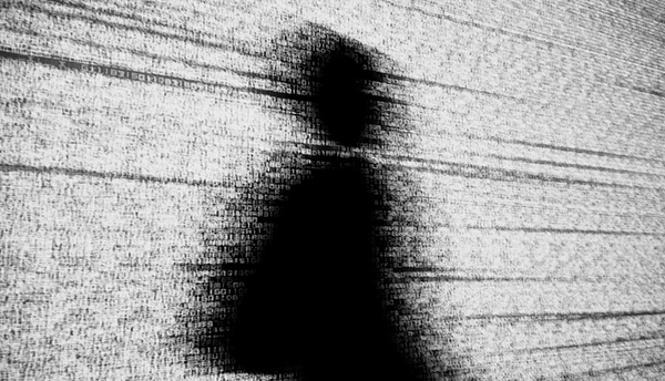 Human shadow made of codes depicting online privacy issue