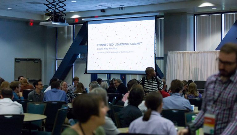 Attendees and banner from the 2019 Connected Learning Summit