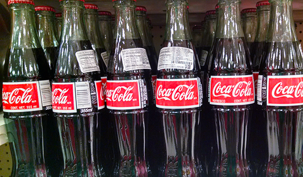Coca Cola bottles lined up
