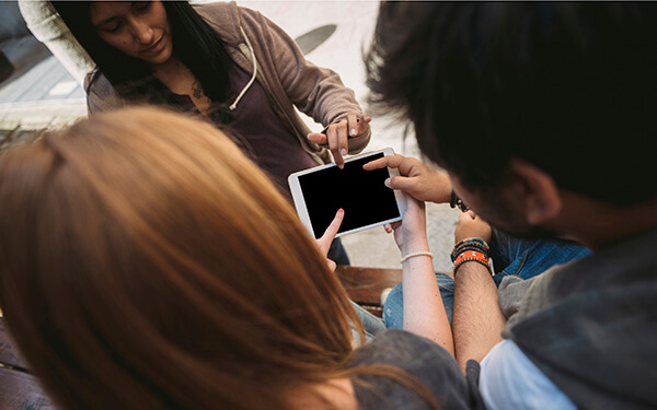 teens using a tablet
