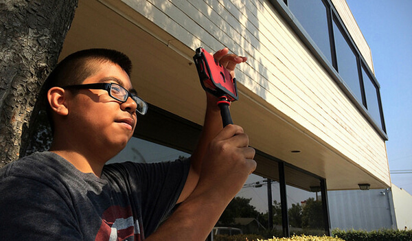 Student takes a photo with a mobile device