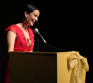 Woman speaking at Podium