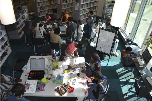 students creating projects in a library